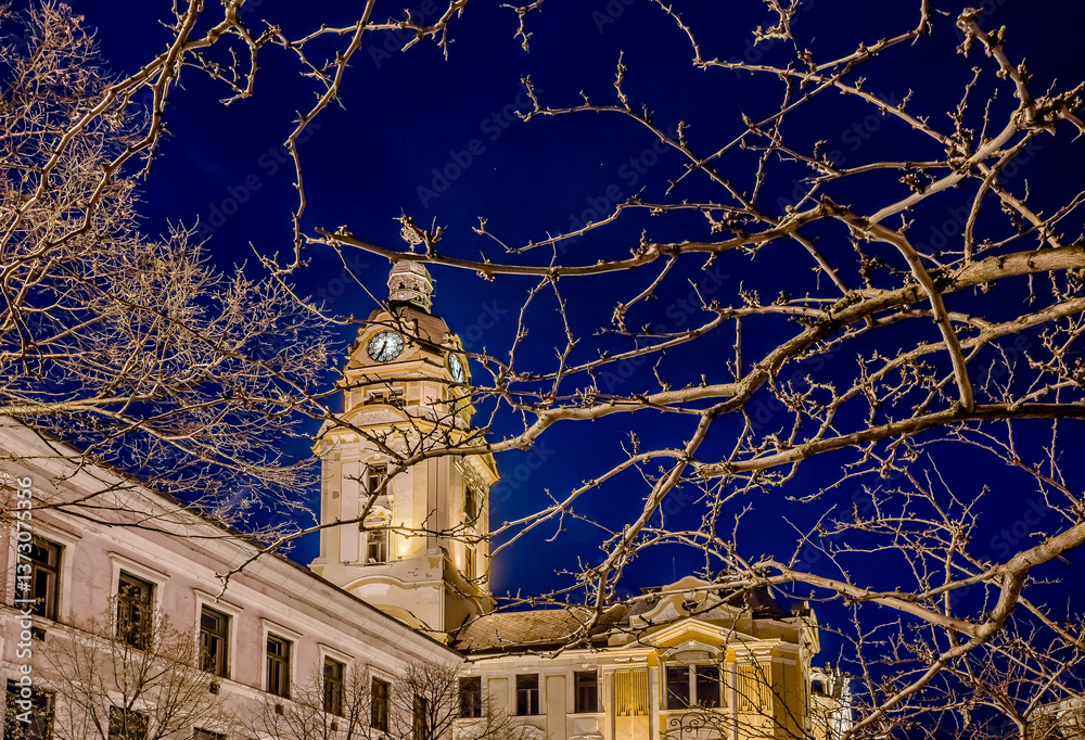 Night photo af a church in Széchenyi square, Pecs, Hungary