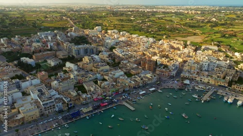 Traditional fishing Marsaxlokk village. Malta island, drone day view