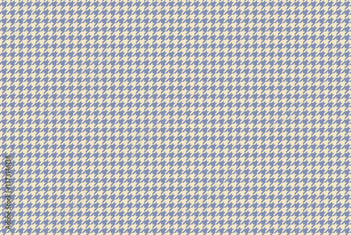 Elegant blue and cream houndstooth pattern. Perfect for textile design, fashion, or website backgrounds.  This timeless classic offers a sophisticated and versatile texture.