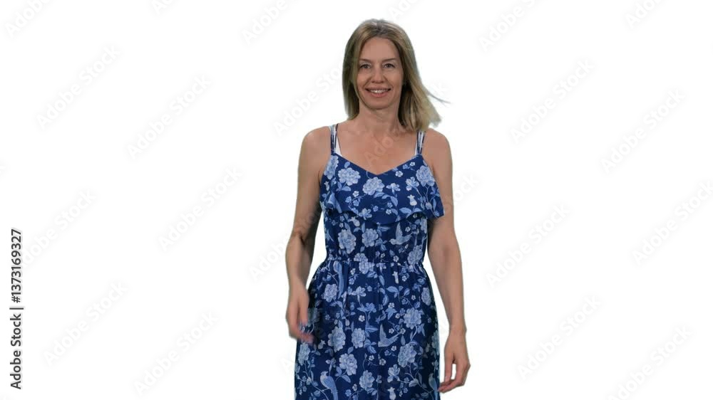Slow motion of beautiful middle-aged woman walking in blue dress and smiling, Full HD footage with alpha transparency channel isolated on white background Slow motion of beautiful middle-aged woman walking in blue dress and smiling, Full HD footage with alpha transparency channel isolated on white background