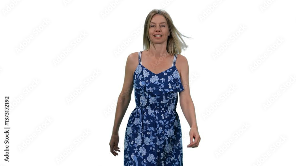 Graceful middle aged woman walking in blue dress and smiling, Full HD footage with alpha transparency channel isolated on white background Graceful middle aged woman walking in blue dress and smiling, Full HD footage with alpha transparency channel isolated on white background