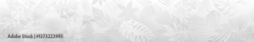 Horizontal seamless banner showcases a minimalist design with various tropical palm leaves in gray tones.