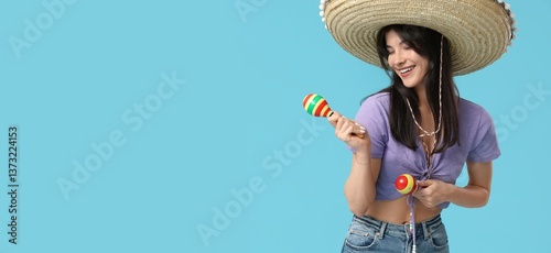 Young woman in sombrero pla...