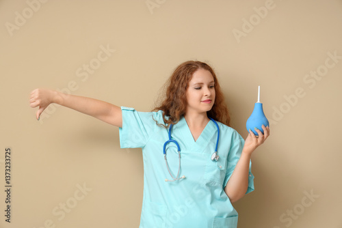 Female doctor with enema sh...
