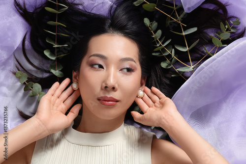 Young Asian woman with beau...