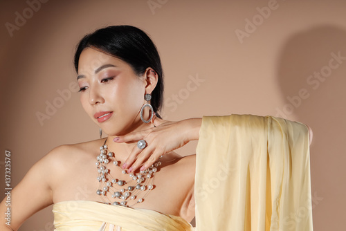 Beautiful young Asian woman...