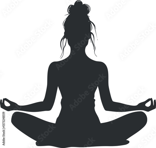 Silhouette of a woman practicing yoga in a lotus pose, representing peace and mindfulness.