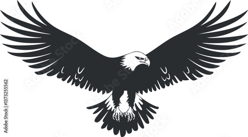 Silhouette of a flying eagle with outstretched wings, showcasing strength and majesty.