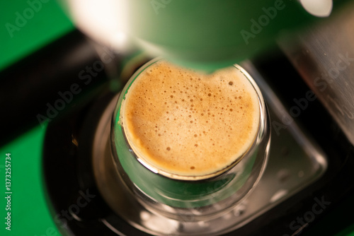 Close-up of Espresso Crema from Top View in Glass Cup