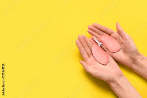 Female hands with paper lun...