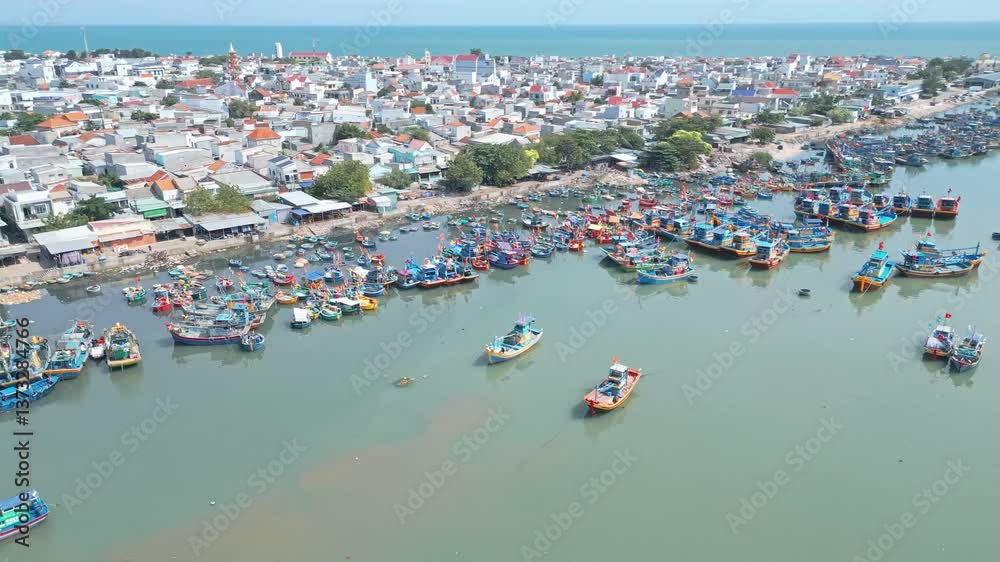 A Beautiful Aerial View of a Coastal Fishing Village Featuring Numerous Boats, Mui Ne, Vietnam A Beautiful Aerial View of a Coastal Fishing Village Featuring Numerous Boats, Mui Ne, Vietnam