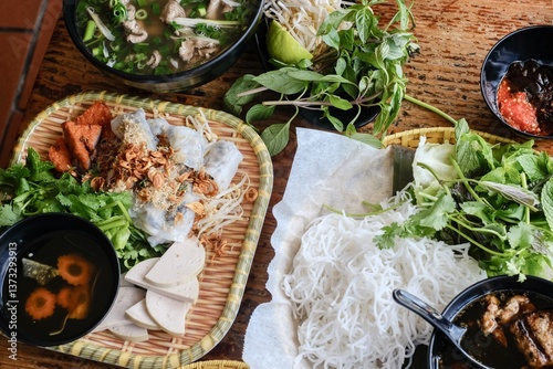 Hanoi-style banh cuon with cha lua (pork sausage), North Vietnamese pho tai lan and bun cha Hanoi with grilled meatballs and a basket of fresh herbs and rice noodles at VN Street Foods in Marrickville
