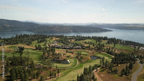 Aerial of golf course and country club around Coeur Dalene Lake in north Idaho in summer