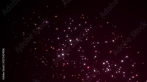 White shiny particles overlay with glittering pink dust moving outward on a black screen.