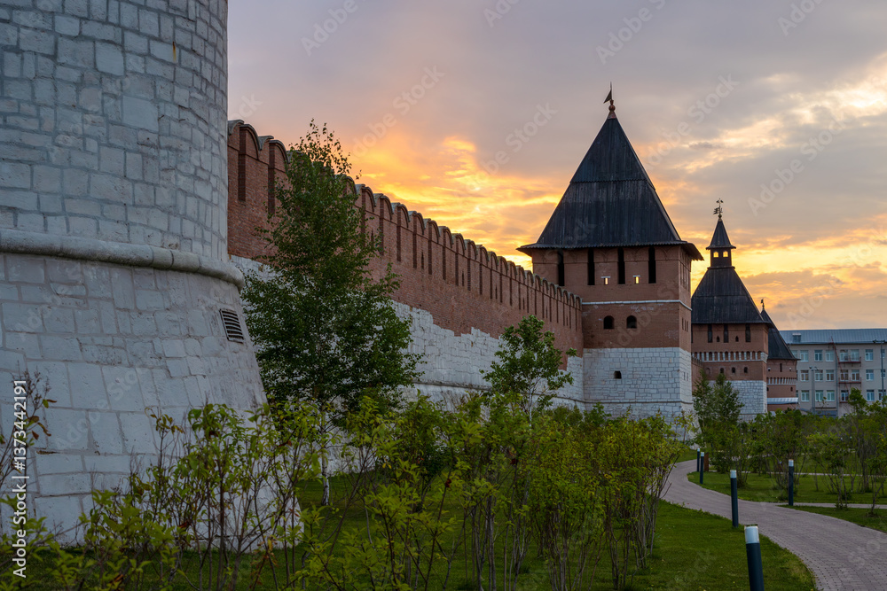 Tula Kremlin, Tula city, Tula region, Russia. View of the fortress wall and towers of the Kremlin. Beautiful summer sunset. Tourist attraction in the historical center of the city.