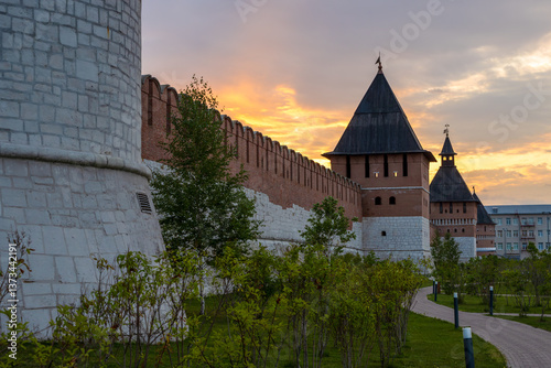 Obraz na płótnie Tula Kremlin, Tula city, Tula region, Russia. View of the fortress wall and towers of the Kremlin. Beautiful summer sunset. Tourist attraction in the historical center of the city. w salonie