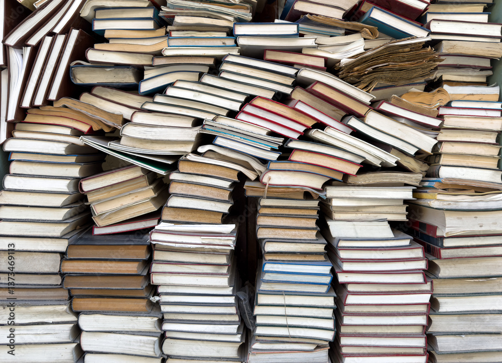 Old books stack background. Antique books on bookstore display Old books stack background. Antique books on bookstore display