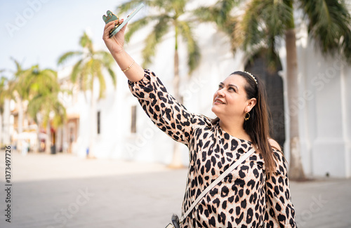Photography Tourist taking selfie in Cartagena de Indias enjoying summer vacations