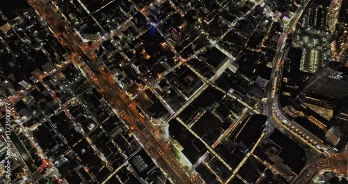 Osaka Japan Aerial v111 high altitude vertical flyover Namba, Nanbasennichimae and Nipponbashi capturing views of downtown area and street traffics at night - Shot with Mavic 3 Pro Cine - Oct 9th 2023 photo