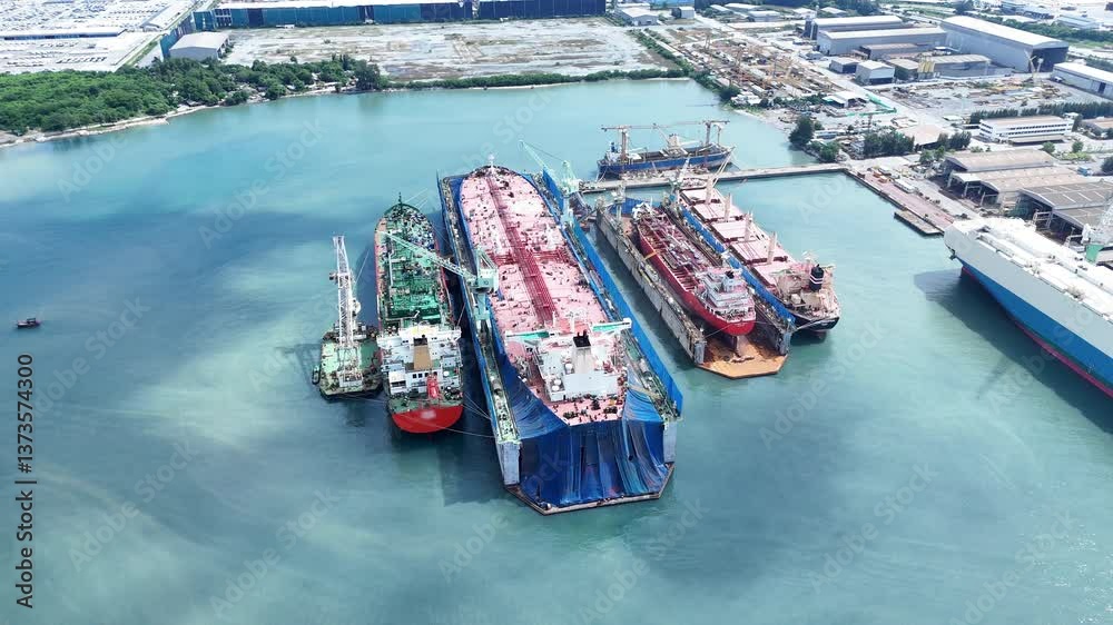 cargo container ship at dry dock concept maintenance service working in the sea. Insurance and Maintenance Cargo Ship concept. Freight Forwarding Service maintenance Insurance.