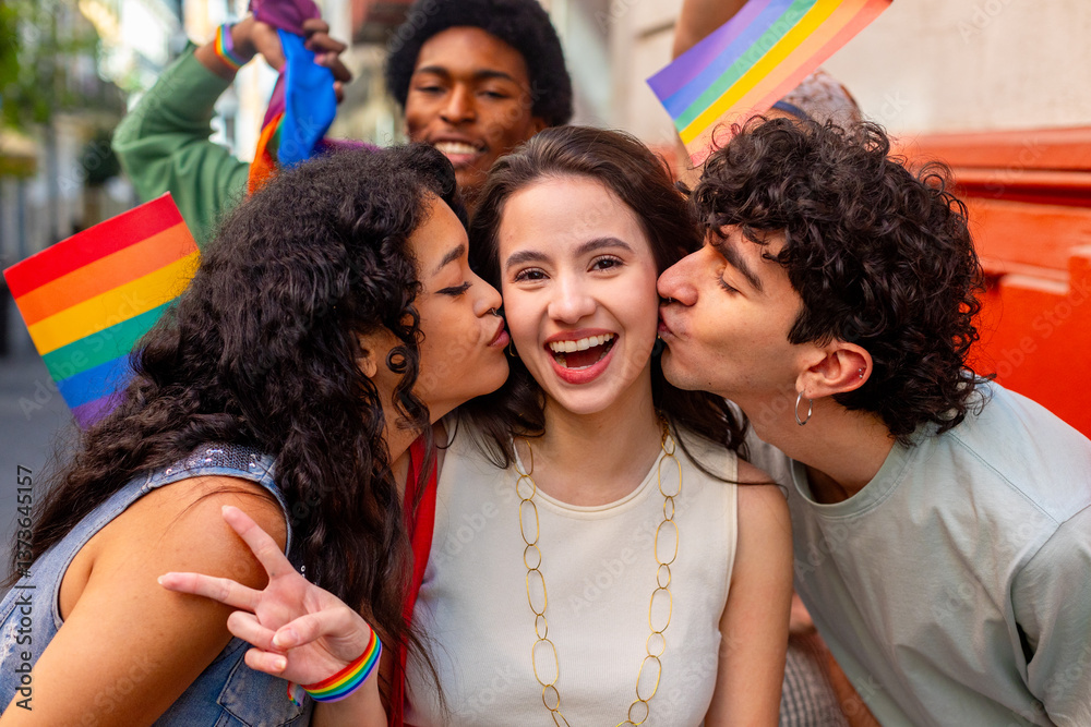Obraz premium Friends kissing woman on cheek at pride parade