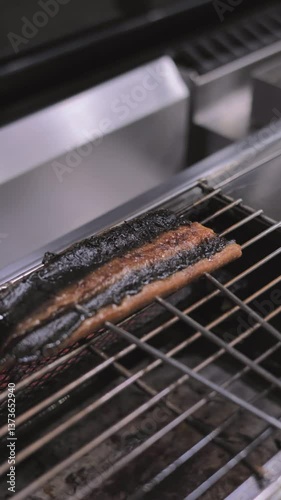 Grilling delicious unagi sushi japan food photography indoor kitchen close-up culinary art