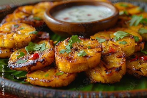 Dominican tostones twice fried plantain slices served with garlic dip on