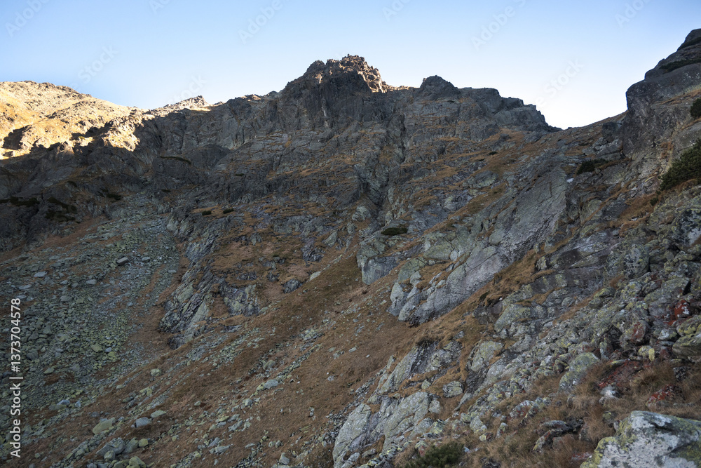 Mountain peaks, High Tatras. Trekking along the national park trail.
Mountain peaks, High Tatras. Trekking along the national park trail.