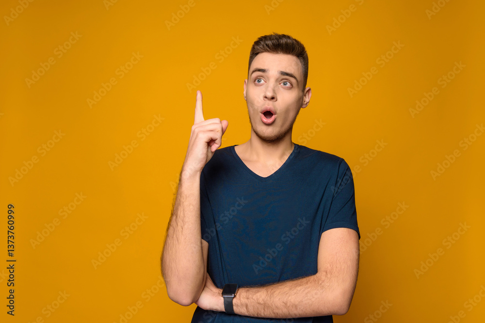 Fototapeta premium Young handsome thin guy has idea. isolated