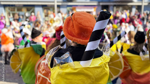 Fotografie Adult in colorful candy-themed costume at carnival parade