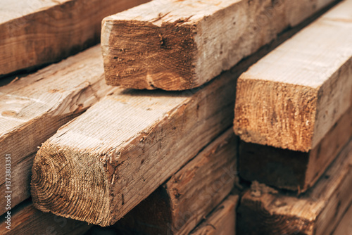 Pile of stacked constriction timber wood on a site