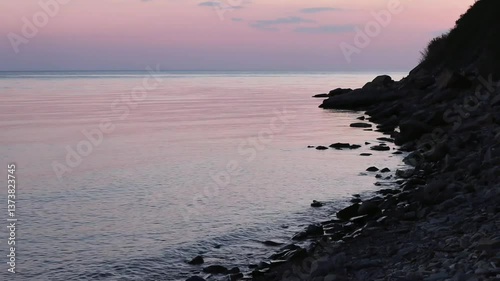 Beautiful, summer, warm sunset on the shores of the Black Sea. Vacation, recreation, tourism. High quality FullHD footage