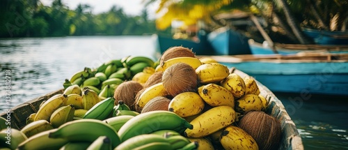 A small boat brimful with ripe bananas and coconuts, gently floating on serene waters under a warm sun.