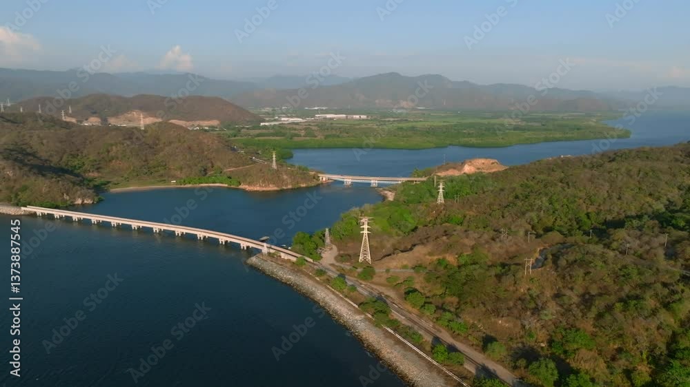 Puente Tepalcates II And Railway Bridge Across Laguna de Cuyutlan Near Manzanillo In Colima, Mexico. aerial shot Puente Tepalcates II And Railway Bridge Across Laguna de Cuyutlan Near Manzanillo In Colima, Mexico. aerial shot