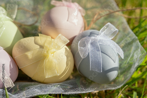 Fotografie A beautiful and colorful arrangement of Decorative Easter Eggs on lush Green Gra