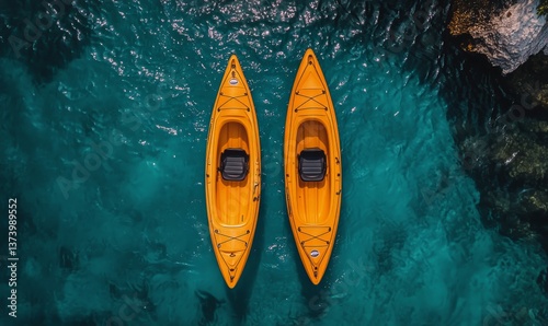 Bright Orange Kayaks Glide Across Calm Blue Waters Near Lush Greenery at Midday