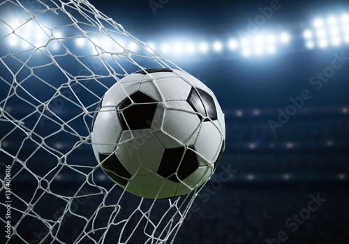 Goal! A dynamic close-up of a soccer ball soaring into the goal net under the bright stadium lights, capturing the moment of victory.