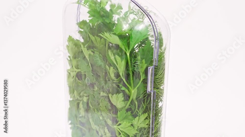 Wallpaper Mural Plastic container with water to store greens in the refrigerator on a white background. convenient dishes and food containers. Torontodigital.ca