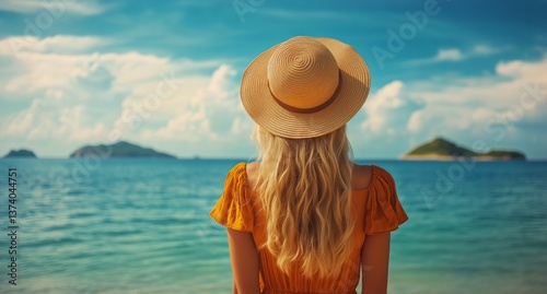 Woman in Straw Hat Gazing at Tranquil Ocean and Islands During a Sunny Day