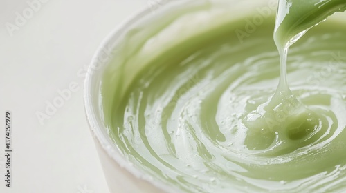 Wallpaper Mural Thick green paste being stirred in a bowl for crafting or cooking activities Torontodigital.ca