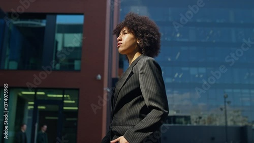Wallpaper Mural Businesswoman walking to work in cityscape Torontodigital.ca