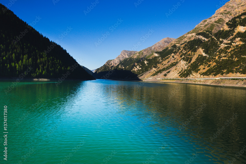Fototapeta premium Alpine Lake. Livigno, Lombardy, Italy