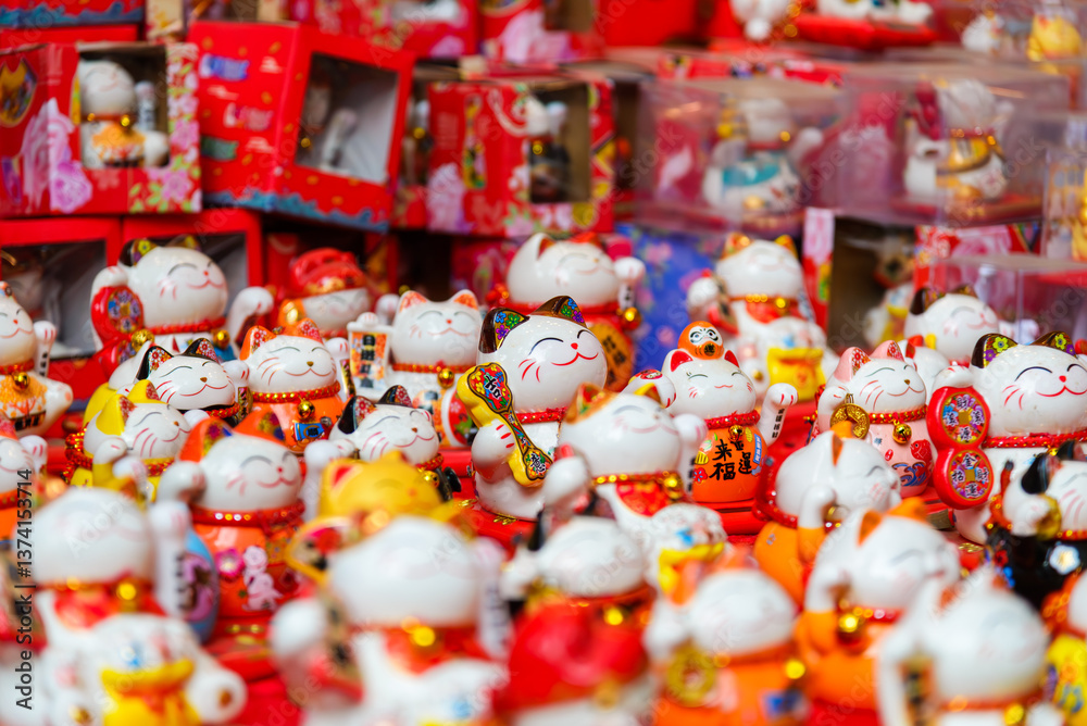 Obraz premium Maneki Neko Lucky Cat Figurines in Hanoi Market