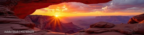 Vibrant orange sunrise illuminating Mesa Arch in Canyonlands National Park,  outdoor,  natural beauty