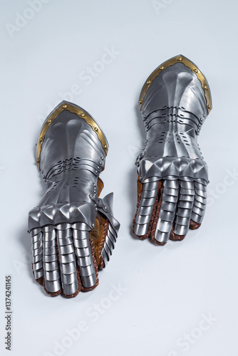 Quadro su tela Pair of steel knight gauntlets with golden accents