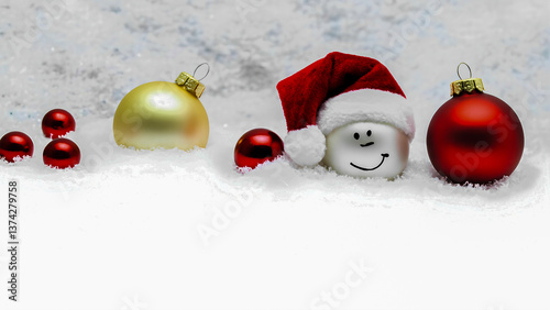 Festive christmas ornaments in snow with smiling face decoration