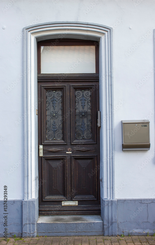 Old wooden house door in German small town, Issum, North-Rhine Westphalia
