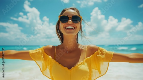 Woman in Yellow Dress Enjoying Sunny Beach Day With Arms Wide Open