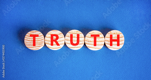 Truth symbol. Concept word Truth on beautiful wooden circles. Beautiful blue table blue background. Business lifestyle truth concept. Copy space.