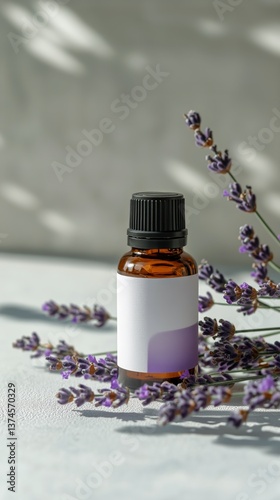 Lavender Essential Oil Bottle Surrounded by Fresh Lavender Flowers on a Soft ...